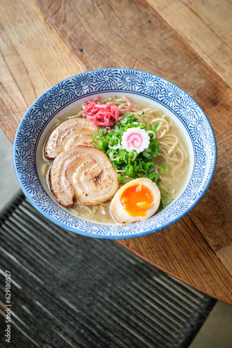 Appetizing ramen soup served with narutomaki