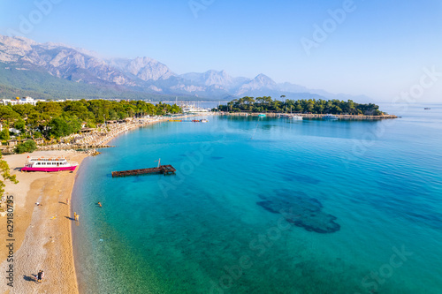 Fototapeta Naklejka Na Ścianę i Meble -  Kemer, Antalya, Turkey. Aerial view of Moonlight Beach in Kemer. Beautiful turquoise colors of Mediterranean sea. Drone shot.