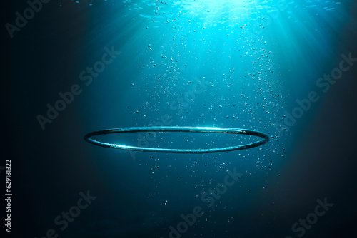 Bubble ring underwater in ocean photo