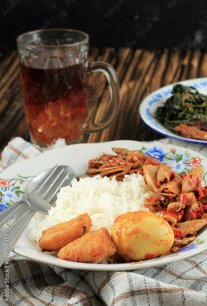 Nasi Rames Warteg, Traditional Indonesian Food. Rice Daily Nasi Rames Warteg, Traditional Indonesian Food. Rice Daily