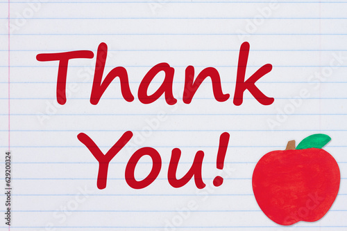 Thank You message with an apple on vintage ruled line notebook paper