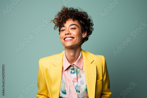 non binary person wearing colorful clothes studio portrait photo