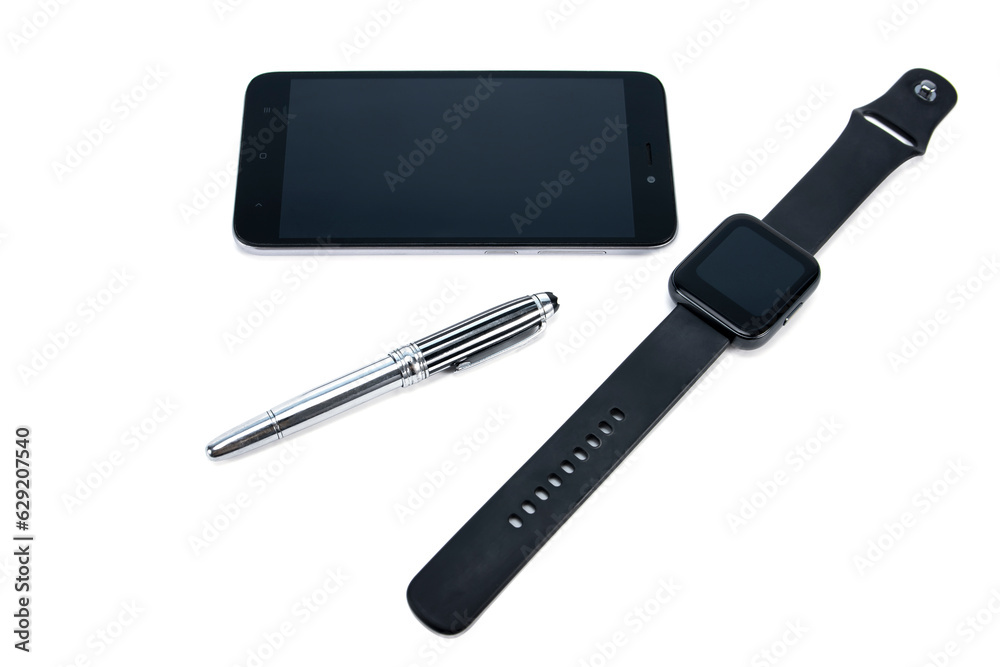 Pen, smart watch and mobile phone isolated on white background. Modern elegant business gadgets isolated Pen, smart watch and mobile phone isolated on white background. Modern elegant business gadgets isolated
