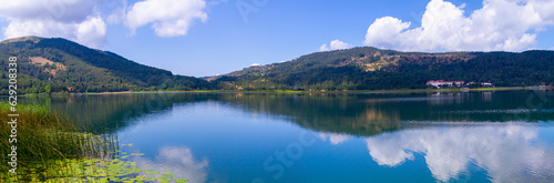 View of Abant Lake (Abant Golu). Landscape of an mountain lake in front of mountain range. Glorious lake landscape. The collaboration of blue and green. Multiple colors and amazing lake scenery.