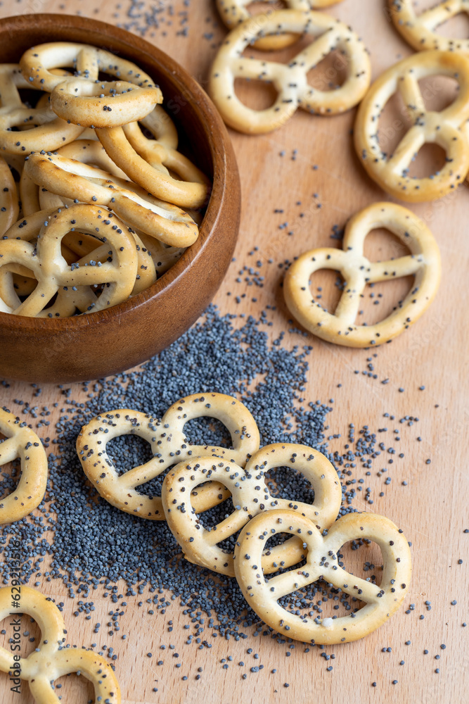 Poppy seed coating dried bagels on the table Poppy seed coating dried bagels on the table