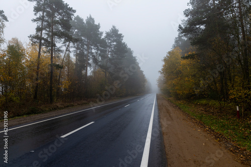 Paved road in cloudy rainy weather