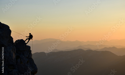 Climbing a Dangerous Rock