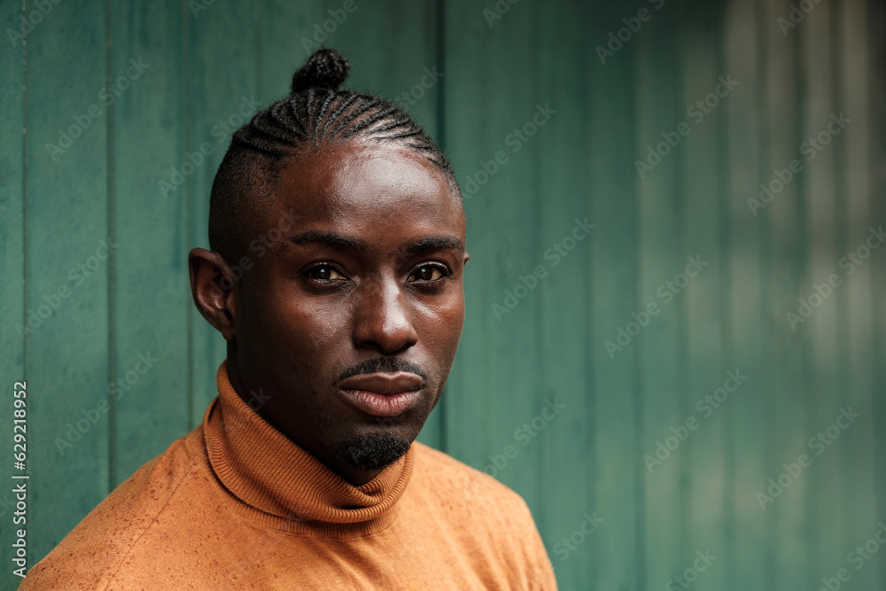 Head-shot of handsome black male model.
