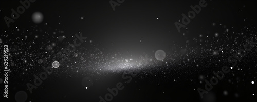 A black and white panoramic background of bokeh effect and a central bright area.