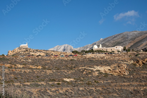 Anafi island -The mountainous landscape and the Monastery of Zoodohos Pigi in Anafi Island. Cyclades islands, Greece
