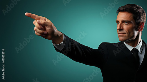 A man in a suit pointing offscreen. Accusing another person.