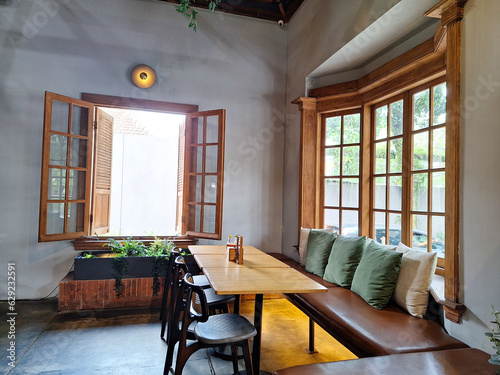 View of breakfast nook at home with window open for air circulation