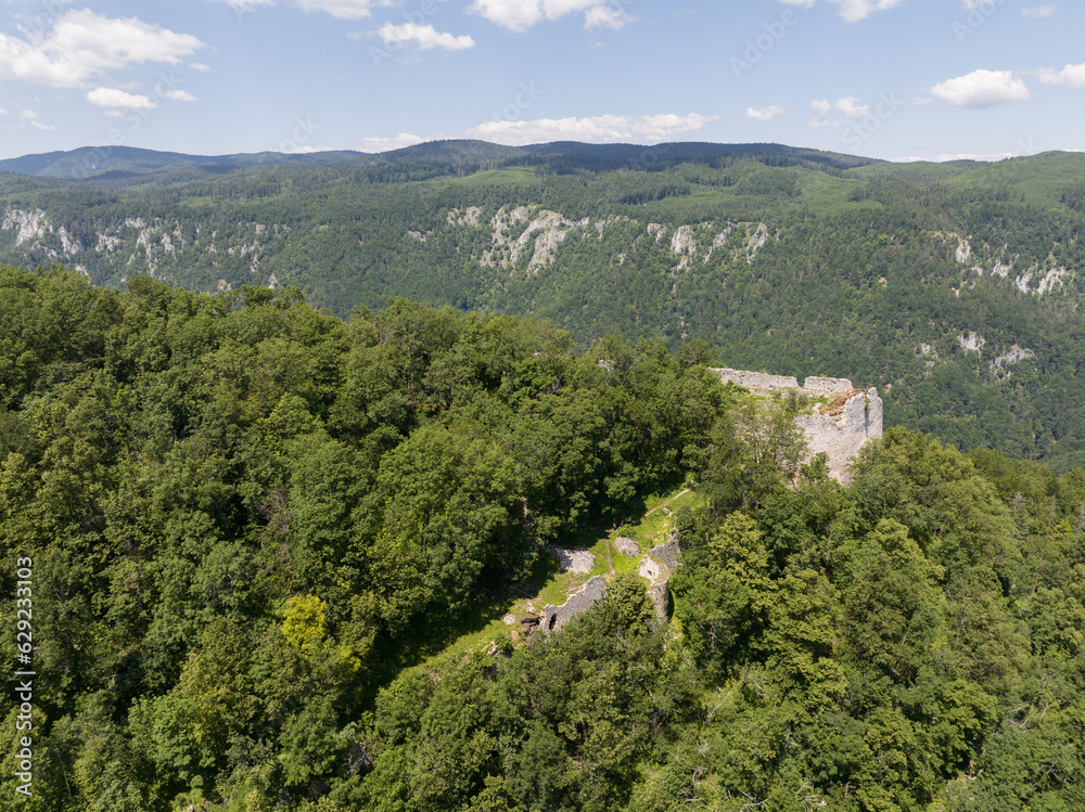 Aerial view of the ruins of the Muran Castle above the village of Muran in Slovakia