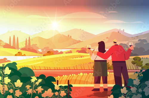 couple drinking wine and enjoying landscape view of with clear river mountain ridge green meadow shores nature tourism travel