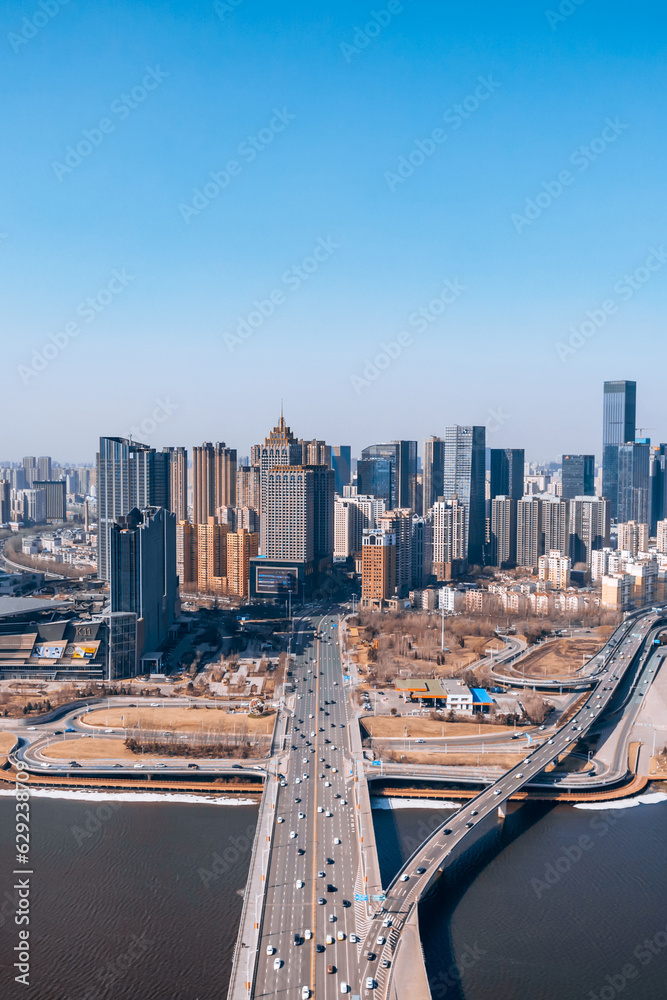 Obraz premium Panoramic view of the CBD city skyline along the Hunhe River in Shenyang, Liaoning, China