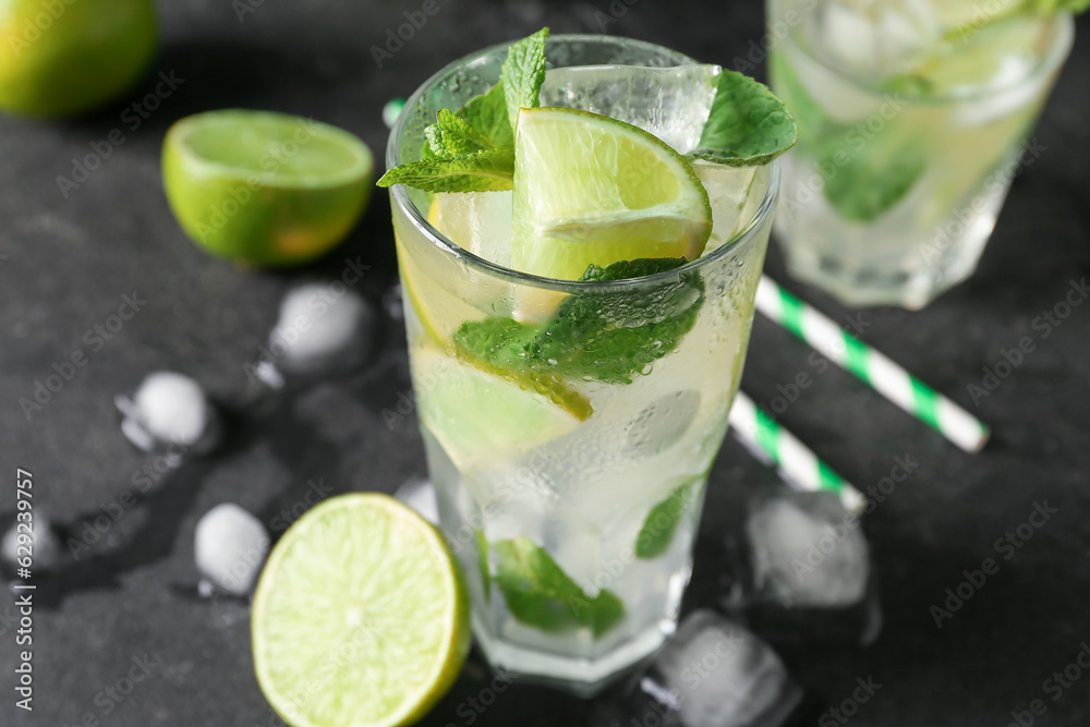 Glass of tasty mojito on dark background Glass of tasty mojito on dark background