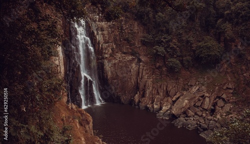 Scenic view of a waterfall located near a forest area in Khao Yai  Thailand
