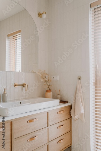 Papier peint Modern bathroom features a unique vanity with contemporary designs and decor ele
