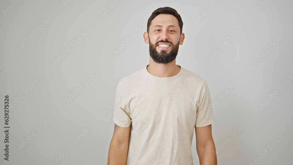 Young hispanic man smiling confident standing over isolated white background Young hispanic man smiling confident standing over isolated white background