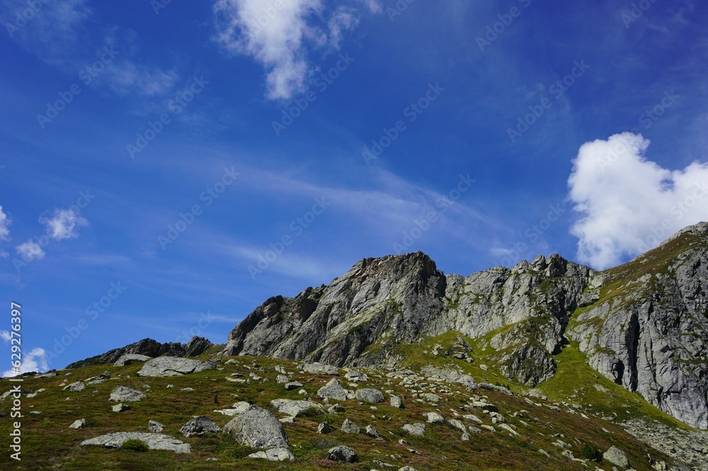 a rocky country landscape under the cloudy sky