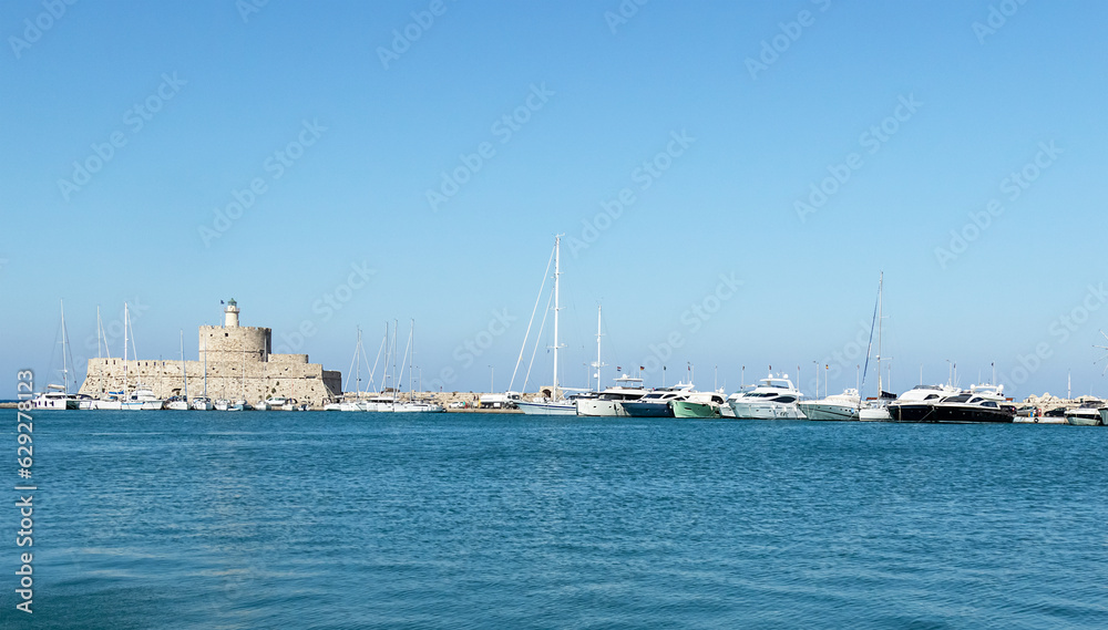 Panoramic view of passenger boats and Fort of Saint Nicholas, circa 15th century building