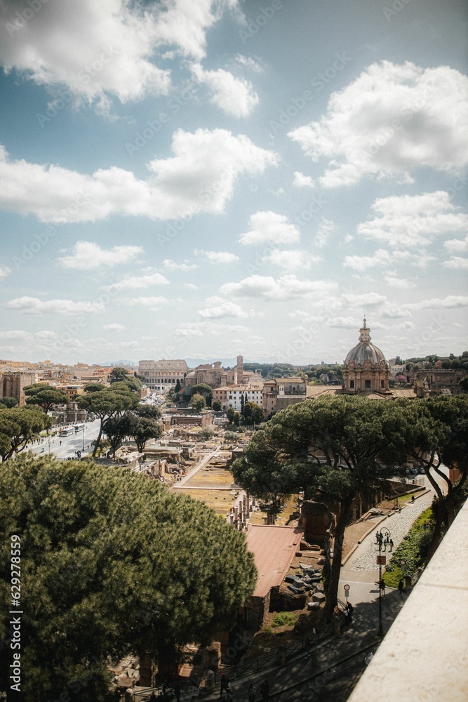 Vertical shot of Rome from a balcony on a sunny day in Italy