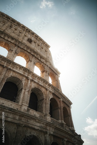 Majestic view of the Roman Colosseum illuminated by the golden sunlight