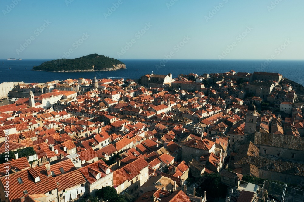 Stunning aerial view of the old town of Dubrovnik, Croatia, bathed in the warm glow of the sun