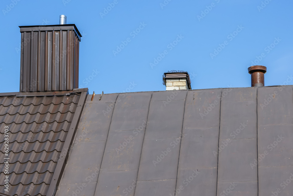 One of the three chimneys with a metal insert One of the three chimneys with a metal insert
