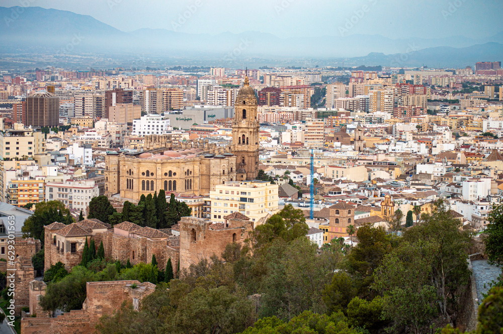 Panoramic aerial view of Malaga in a cloudy summer day in the morning in Malaga, Spain on July 17, 2023