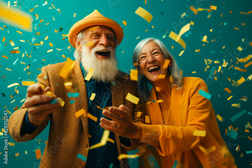 Happy laughing senior older people grandad grandpa grandma and falling confetti on teal blue background. Modern old friends with smile celebrating at party, silent disco, cyberspace.. Generative AI.