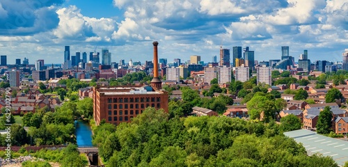 Panoramic View of Manchester Skyline showing old warehouse and chimney. 