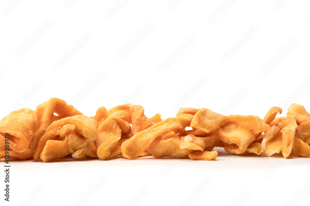 Fototapeta premium Dried melon slices isolated on a white background.