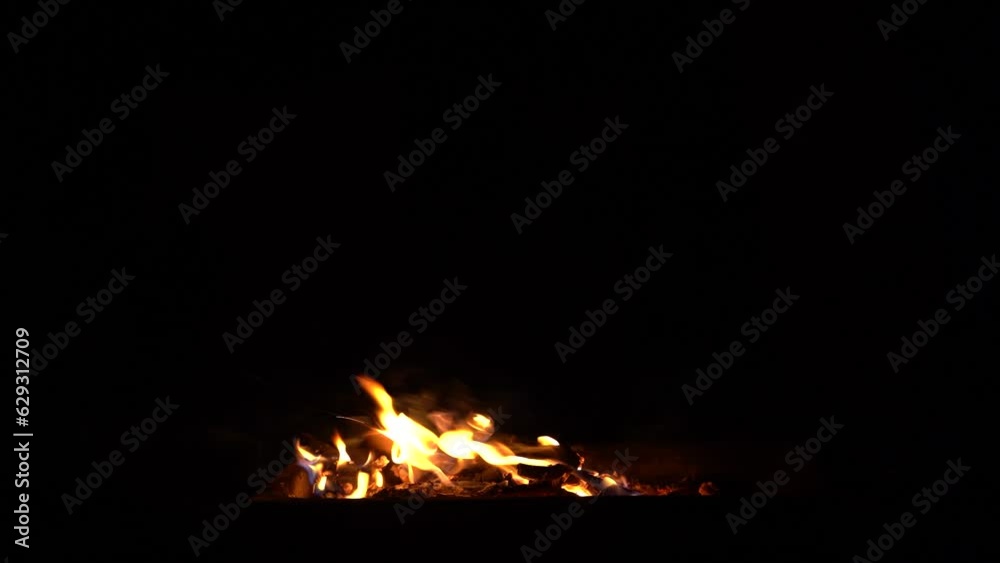 Fire Flames Igniting And Burning - Slow Motion. A line of real flames ignite on a black background. Real fire. Fire Flames Igniting And Burning - Slow Motion. A line of real flames ignite on a black background. Real fire.