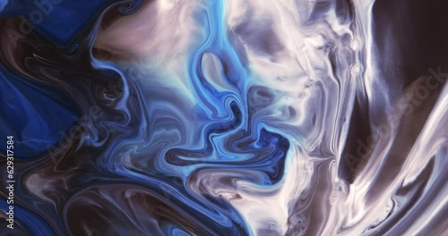 Liquid marble background in blue tones. Background of abstract motion of liquid waves. Abstract art.