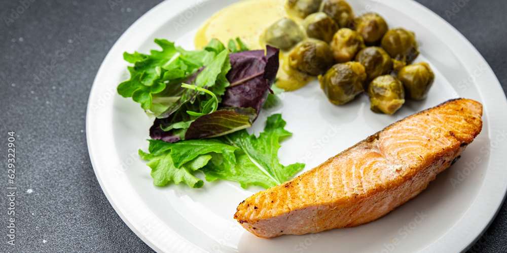 salmon fried fish second course meal food on the table copy space food background rustic top view salmon fried fish second course meal food on the table copy space food background rustic top view