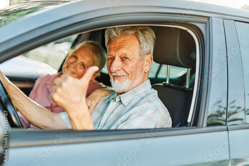 senior car couple woman man driving happy old retirement elderly retired lifestyle vehicle travel mature adult transport male female automobile auto drive transportation