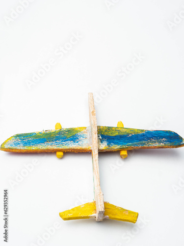 Picture of Wooden aeroplane craft on a white isolated background