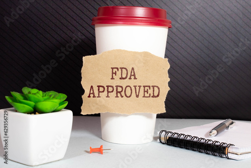 Rubber stamping that says 'FDA Approved'. photo