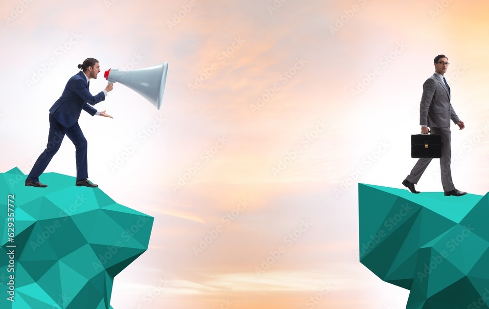Obraz premium Businessman shouting with loudspeaker at others