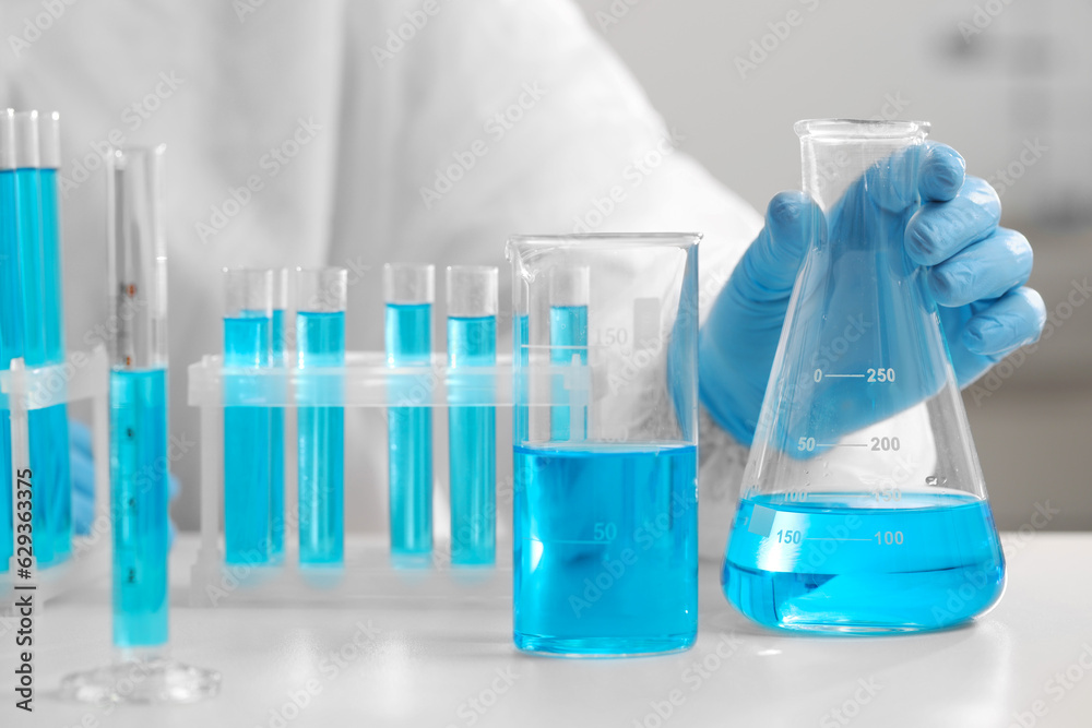 Scientist working with sample in laboratory, closeup Scientist working with sample in laboratory, closeup