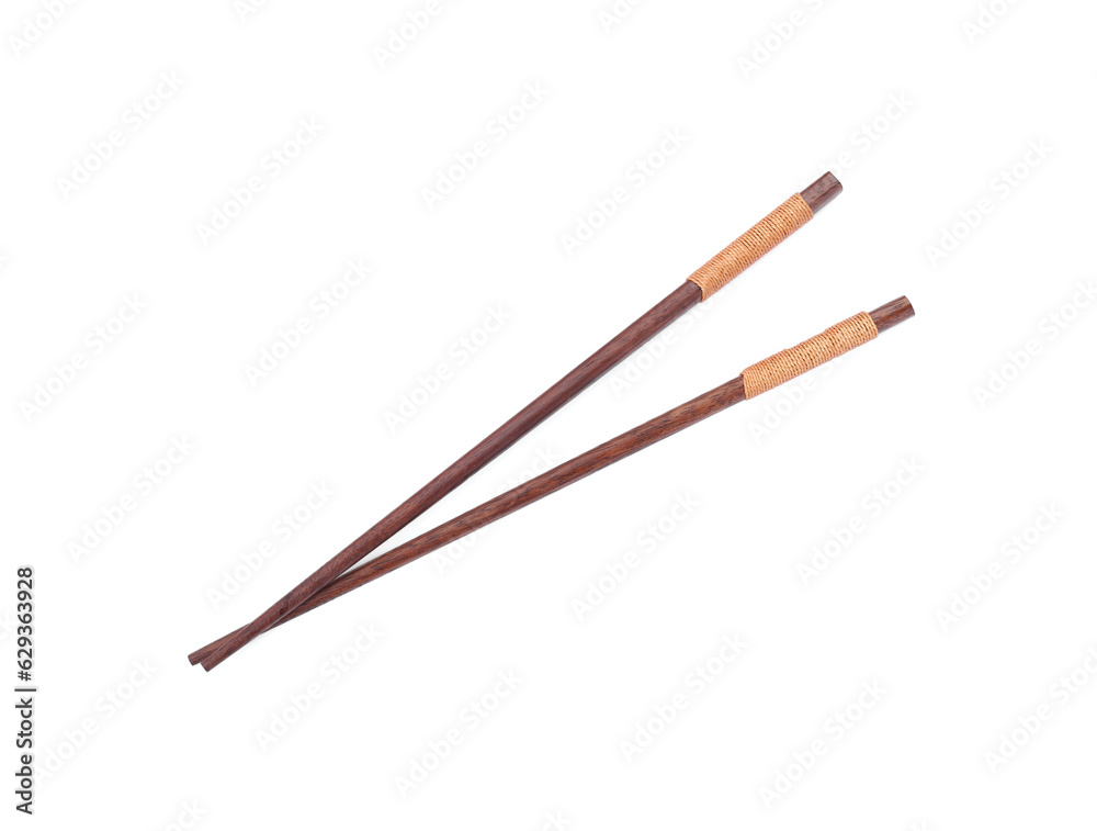 Pair of wooden chopsticks isolated on white, top view