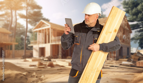Man builder. Worker with wo...