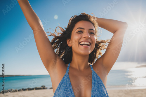 Happy woman with arms raised on a beach. Generative AI