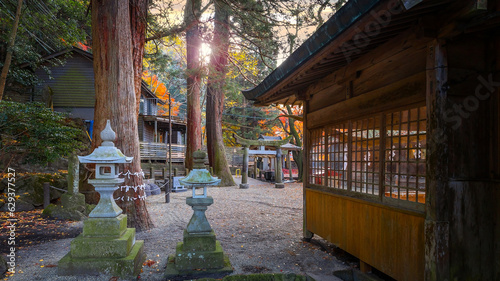 Yufuin, Japan - Nov 27 2022: Tenso-jinja shrine at lake Kinrin, is one of the representative sightseeing spots in the Yufuin area at the foot of Mount Yufu.