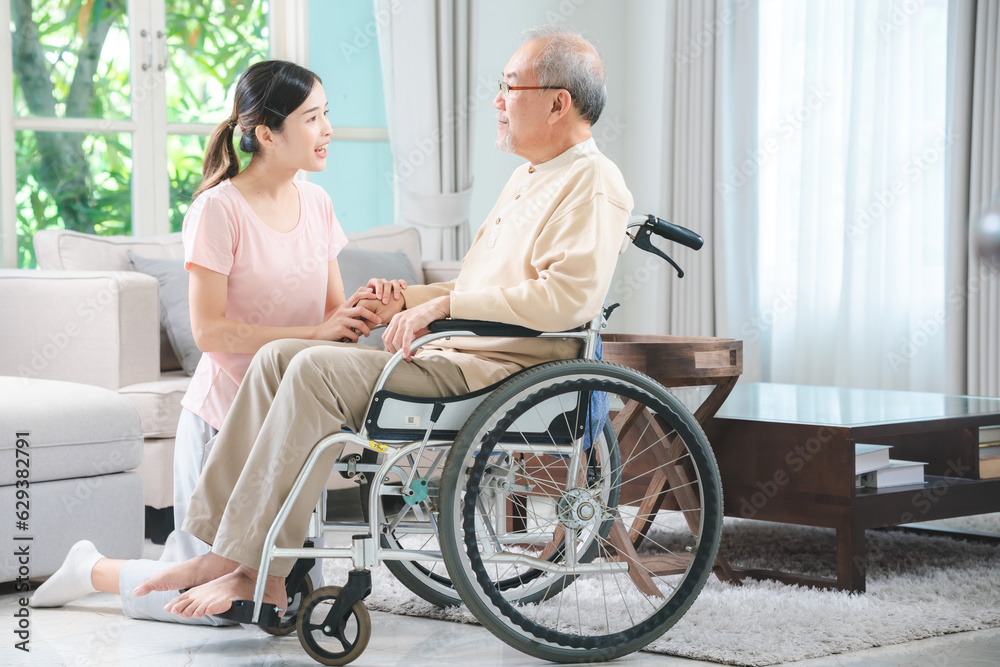 Asian family health care and insurance business at home concept, woman daughter take care support to senior elderly father patient in wheelchair together, dad having smile in happy love lifestyle Asian family health care and insurance business at home concept, woman daughter take care support to senior elderly father patient in wheelchair together, dad having smile in happy love lifestyle