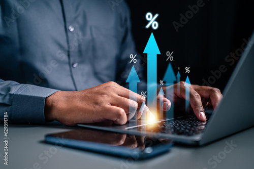 investor, interest, finance, financial, investment, stock, graph, growth, banking, invest. touching on keyboard to check interest of investment growth line of percent symbolizes success embracing.