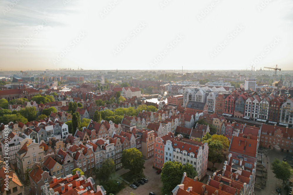 Beautiful panoramic architecture of old town in Gdansk, Poland at sunrise. Aerial view drone pov. Landscape cityscape City from Above. Small vintage historical buildings Europe Tourist Attractions