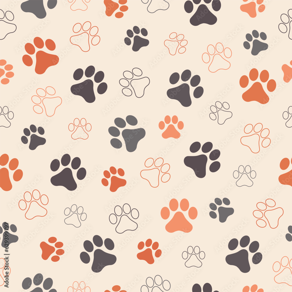 Fototapeta premium Paw animal print silhouettes. Seamless pattern with paws