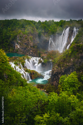 Picturesque waterfalls in the green forest, Plitvice lakes, Croatia